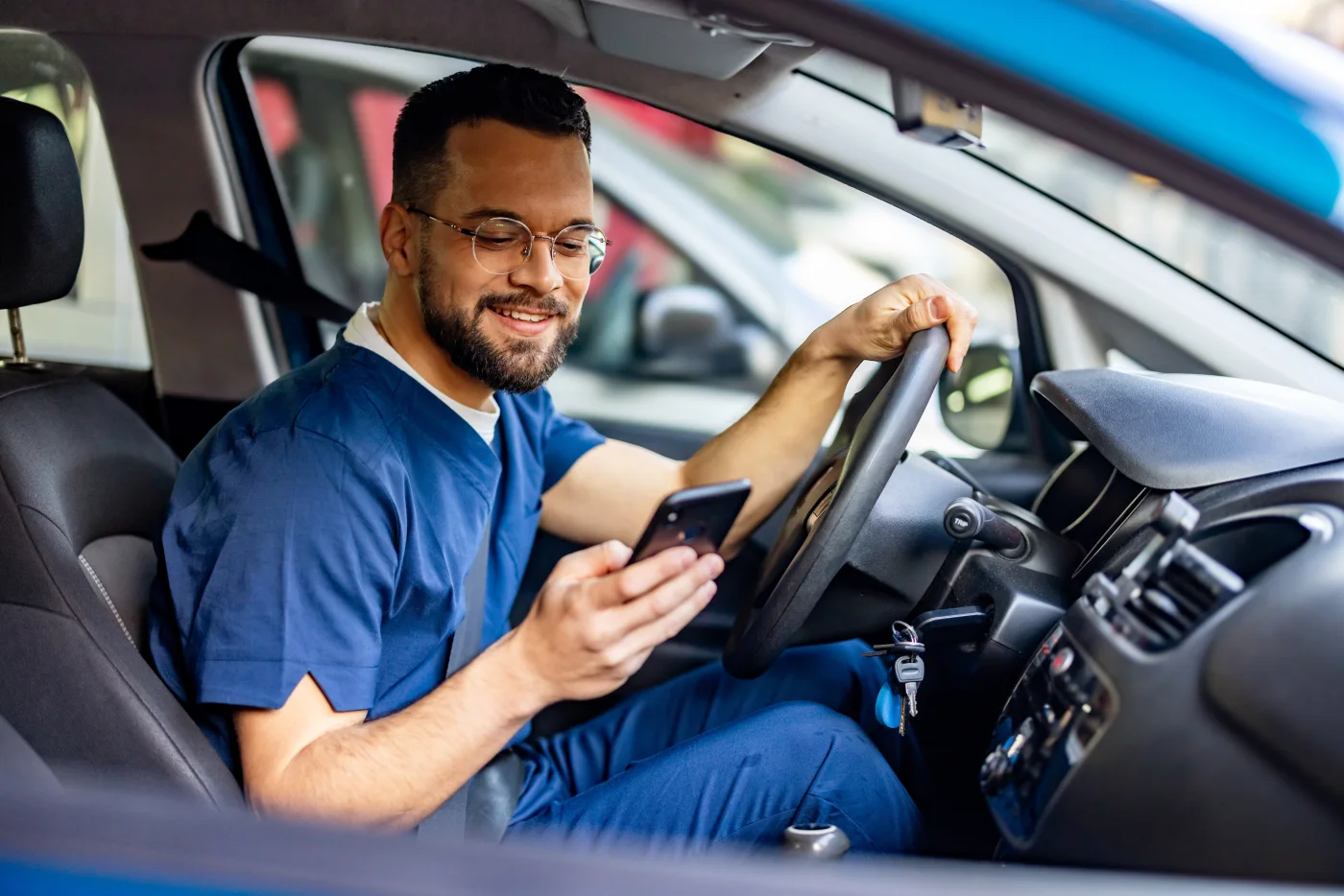A mobile physical therapist working between visits